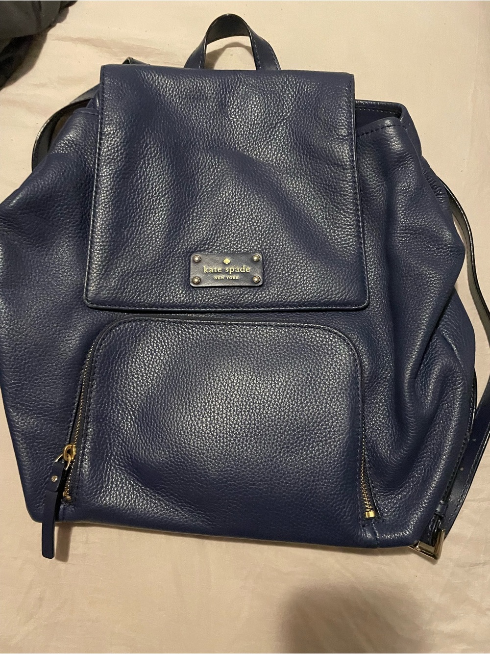 Kate Spade navy pebbled leather backpack